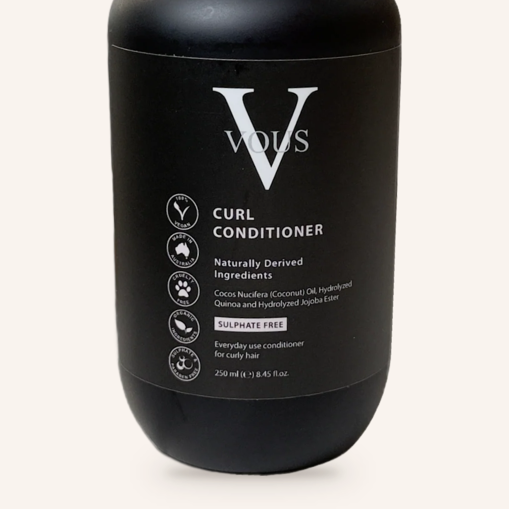 Close-up of the Vous Care Curl Conditioner label