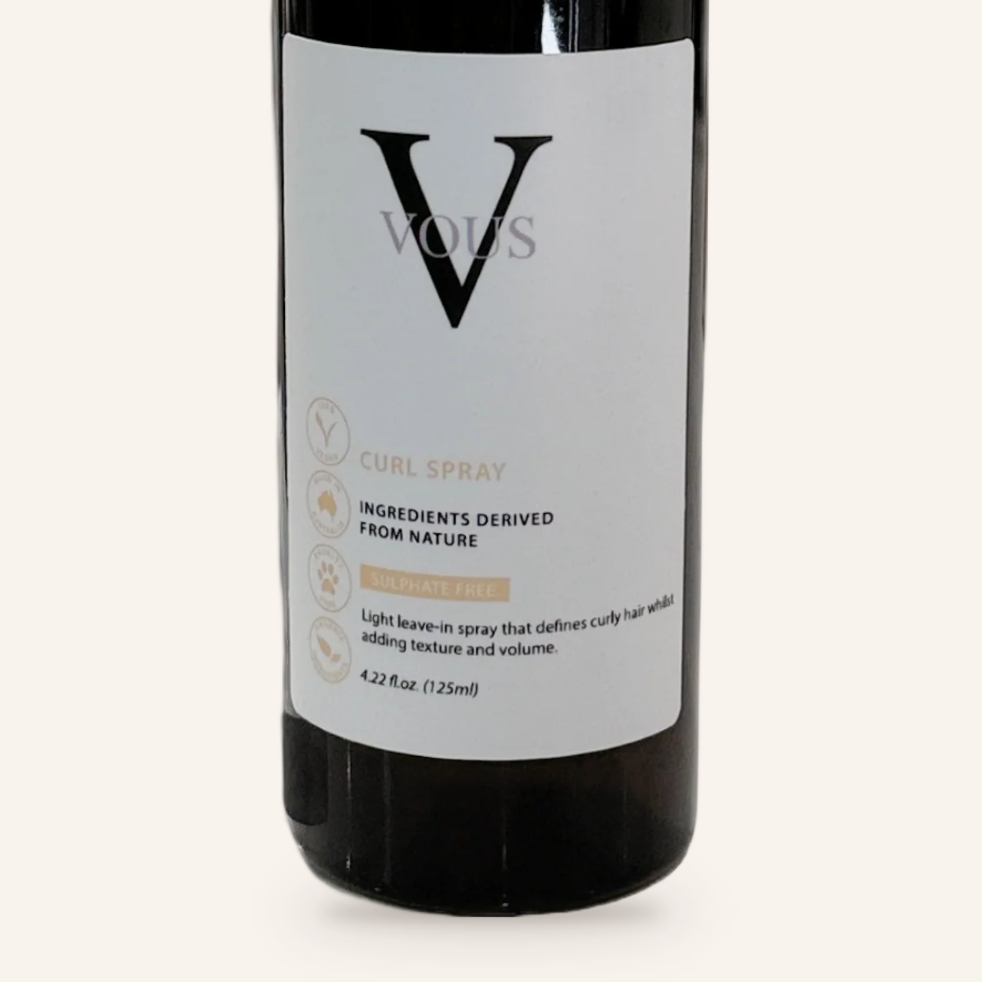 Close-up of the Vous Care Curl Spray label