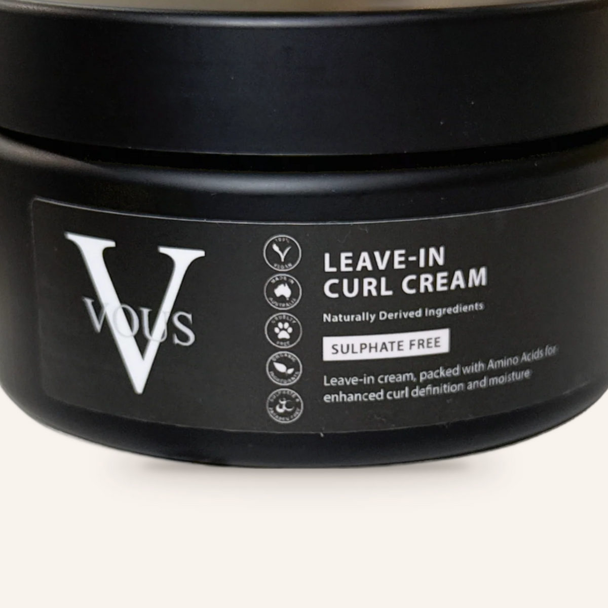 Close-up of the Vous Care Leave-In Curl Cream label