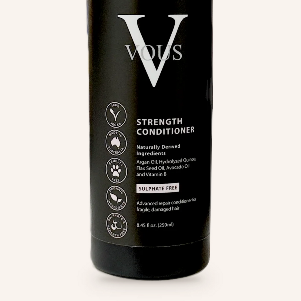 Close-up of the Vous Care Strength Conditioner label