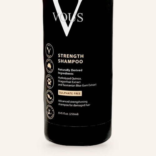 Close-up of the Vous Care Strength Shampoo label